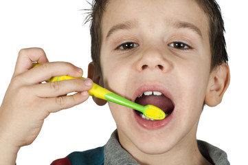 Boy brushing his teeth