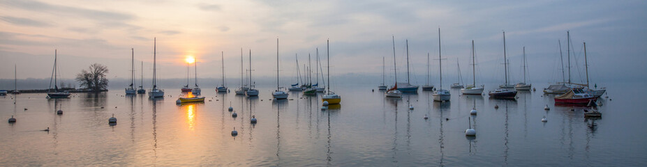 Panoramic view of Boats and Sunrise - obrazy, fototapety, plakaty