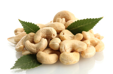tasty cashew nuts with leaves, isolated on white