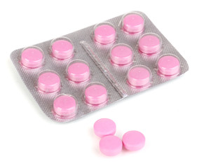 Pills packed in blister isolated on white
