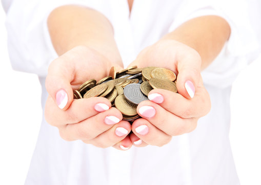 Woman hands with coins isolated on white