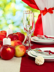 beautiful holiday table setting with apples, close up