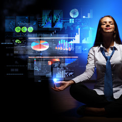 Business woman with financial symbols around