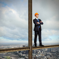 Businessman standing on the construction site