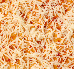 pizza dough with grated cheese