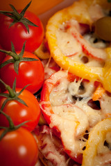 Pizza with mushrooms, cheese, sausage and peppers.