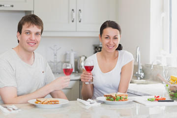 Obraz na płótnie Canvas Young couple enjoying their meal