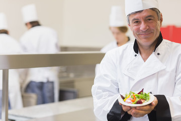 Chef presenting his salad