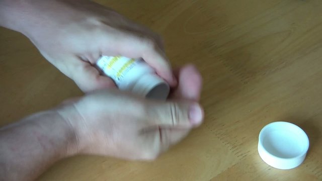 Shaky Hands Opening Pill Bottle