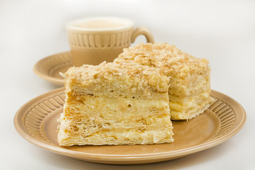 napoleon cake and a cup of coffee