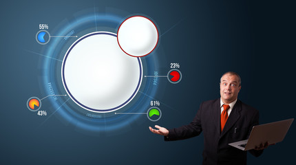 businessman holding a laptop and presenting abstract modern pie