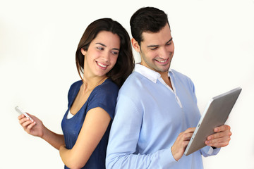 Couple websurfing on internet with new technologies