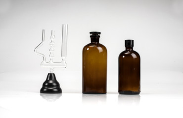Obraz na płótnie Canvas Pharmacy bottles and test-tubes
