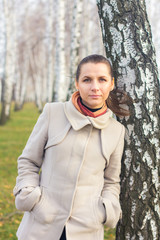 Portrait of a girl under the birch