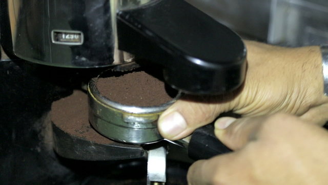 Tamping coffee with bayonet