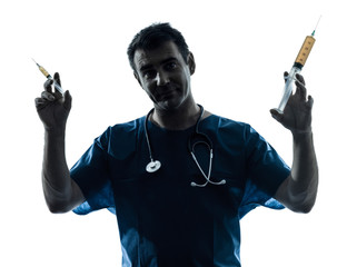 doctor man holding hypodermic syringe silhouette portrait