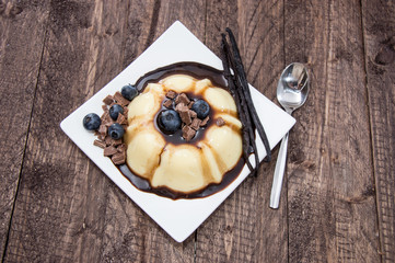Portion of Vanilla Pudding with sauce
