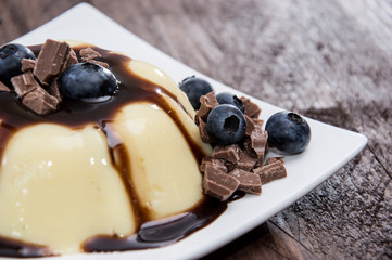 Vanilla Pudding with Berries and Sauce