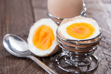 Halved egg on wood