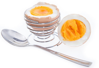 Halved egg isolated on white