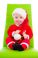 kid in Santa Claus clothes