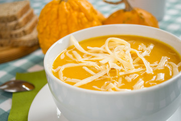 Pumpkin soup in a white plate