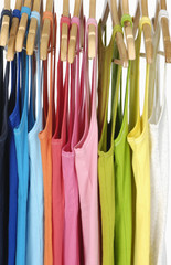 different colors peignoir on wooden hangers