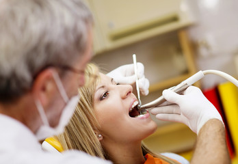 Patient is having a dental treatment