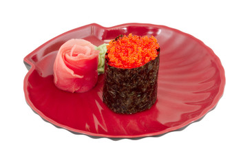 Sushi with fying fish caviar isolated over white background