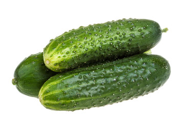 Healthy food. The green cucumbers isolated on white background