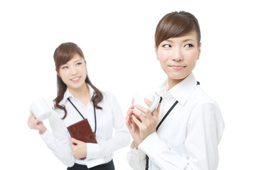 Beautiful asian businesswomen on white background