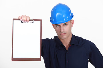 craftsman holding clipboard