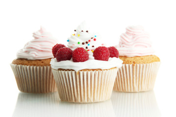 tasty cupcakes with berries, isolated on white