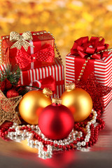 Christmas decoration and gift boxes on golden background