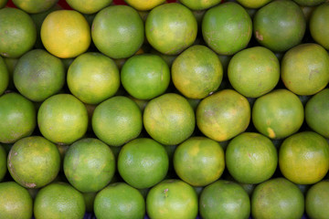 Arrangement of orange fruits in the market