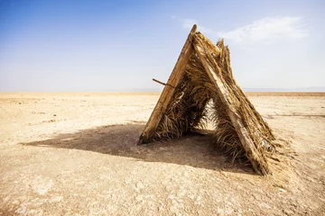 Fotobehang Wooden tent in the salt lake of Chott El Djerid, Tunisia. © mrks_v