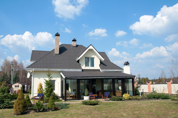 A new house with a garden in a rural area