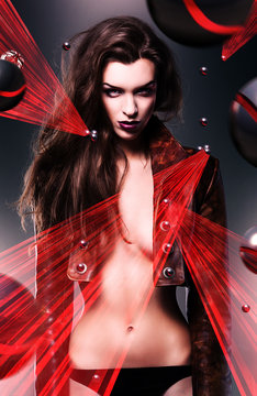 pretty beautiful erotic dj woman in brown jacket with laser ligh