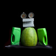 cute funny robot toy made of garbage. recycling waste