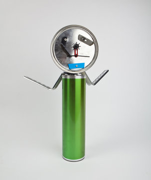 cute funny robot toy made of garbage. recycling waste