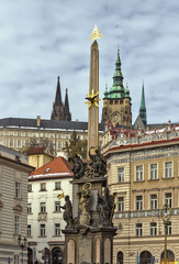 Fototapeta na wymiar Kind on a column of a sacred Trinity, Prague