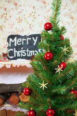 Christmas and New Year tree, tablet with an inscription merry ch