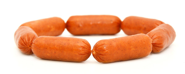 Little sausages isolated on white background