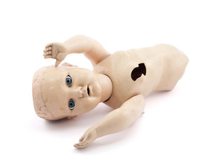 Abandoned child's baby doll with clipping path