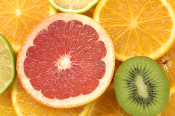 Fototapeta na wymiar mixed sliced citruses