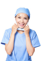 woman doctor happy taking off mask