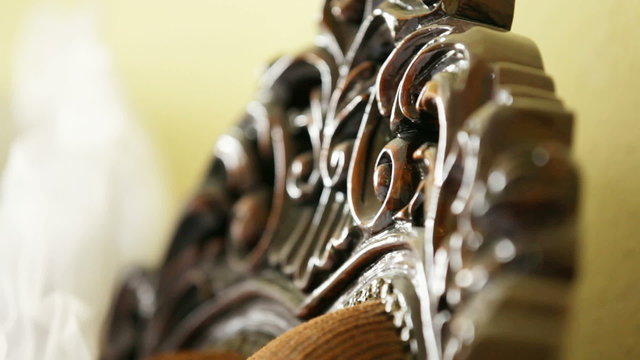Luxurious chair with a carved ornament