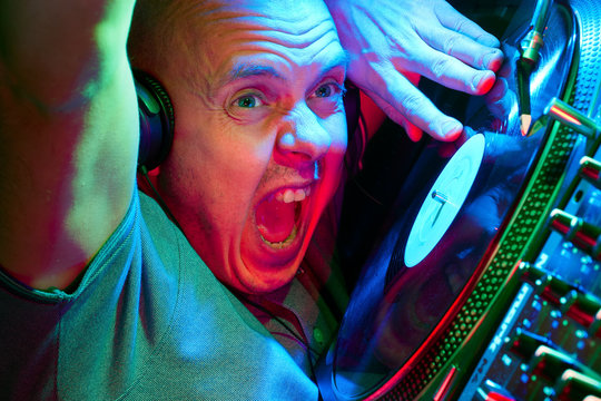 DJ going crazy on the turntables