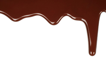 Melted chocolate dripping on white background
