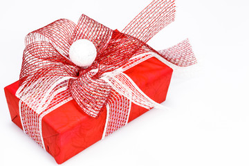 Red gift box with gift ribbon isolated on white yellow